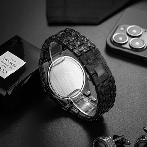 Macro view of black iced-out watch band texture with luxurious diamond setting craftsmanship