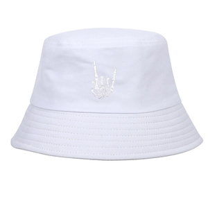 White canvas bucket hat featuring skeletal hand embroidery and trendy streetwear style