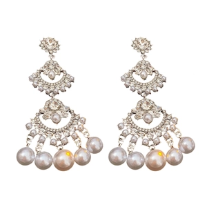 Silver needle fan-shaped tassel pearl earrings with rhinestones on white background