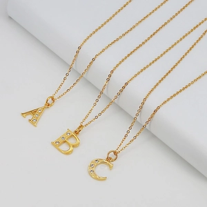 Titanium steel 18K gold letter necklaces with crystal inlaid A B C pendants
