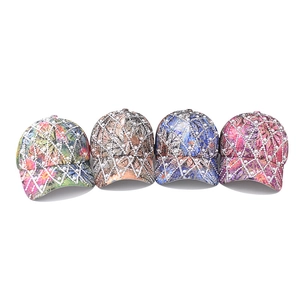 Floral and abstract baseball caps with rhinestone grids and white pearl embellishments