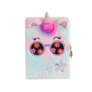 A5 plush unicorn diary with colorful tie-dye fur, embroidery detail and a metal lock