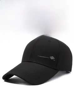 Detail of black baseball cap side featuring SPORT text print and metallic decoration