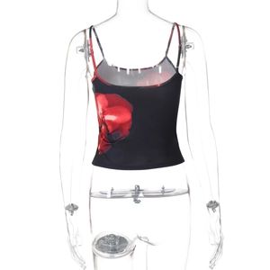 Detailed view of black slim fit crop top with red floral print and elastic knit texture