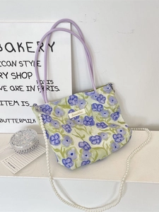 Floral print canvas bag with purple PU strap and pearl chain detail in a sweet style