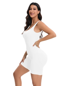Detail view of white ribbed seamless yoga jumpsuit with slim fit and athletic cut