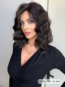 Detail view of 16-inch long wavy dark brown synthetic wig with natural shine texture