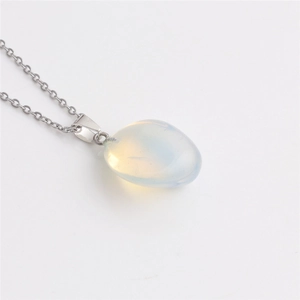 Detail showing white opal gemstone pendant on silver chain for elegant necklace