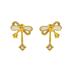 Detailed macro view of golden bow earrings featuring white shell inlay and zircon accents