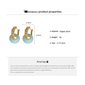 Detail of round green faux jade earrings with gold plating and cubic zirconia dimensions