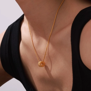 Elegant gold titanium steel snake chain necklace with a pave crystal cylinder pendant
