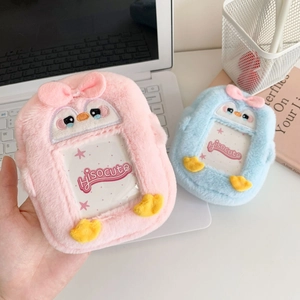 Plush penguin card holders in pink and blue with bows and transparent slots