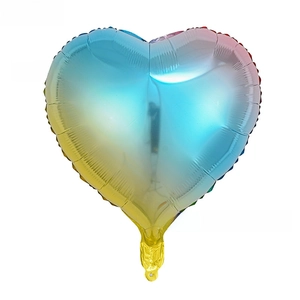 Detailed view of 18 inch heart-shaped balloon with gradient rainbow metallic finish