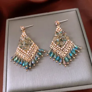 Vintage bohemian tassel earrings with blue-green teardrop crystals and pearl accents