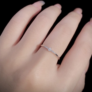 Elegant 925 sterling silver ring with sparkling zircon stones on a model hand