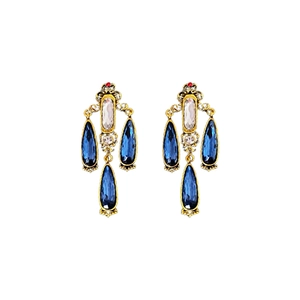 Vintage palace style long tassel earrings with blue teardrop crystals and gold finish