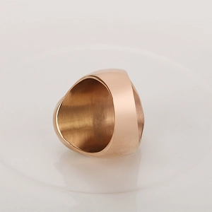 Minimalist rose gold stainless steel signet ring with polished finish and brushed texture