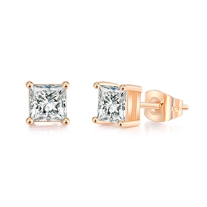 Detailed view of square-cut zircon earrings with rose gold four-prong setting and butterfly back
