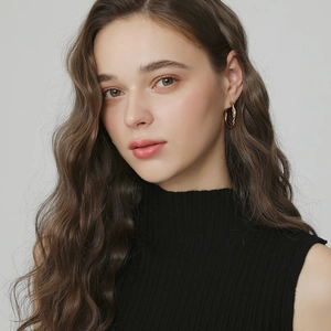 Minimalist gold twisted geometric hoop earrings for women in a vintage aesthetic