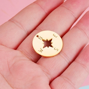 22mm gold stainless steel compass pendant with star cutout and N E S W engraving