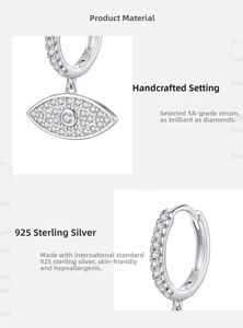 Detailed macro of 925 sterling silver evil eye earrings with 5A cubic zirconia stones