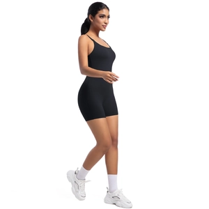 Side view of a black high-stretch sports bodysuit with slim straps and athletic cut