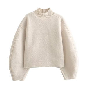 Women's minimalist loose off-white knitted sweater with stand collar and drop shoulders