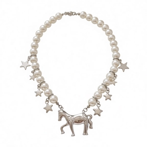 Elegant pearl necklace featuring silver star charms and detailed horse pendant on white base