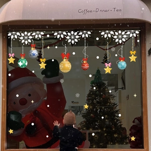Christmas window stickers with white snowflakes, colored baubles and golden stars decals