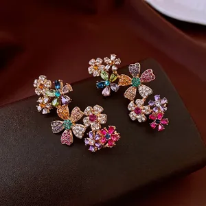 Luxurious 18k gold plated flower stud earrings with vibrant multi-colored crystals