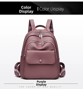 Detailed view of the purple textured faux leather backpack with front magnetic pocket
