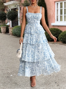 Detail of floral tiered maxi dress with blue flower prints and layered ruffle hem