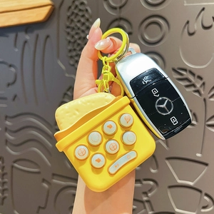 Porte-clés mignon en forme de pain de mie en silicone avec crochet jaune pour sacs