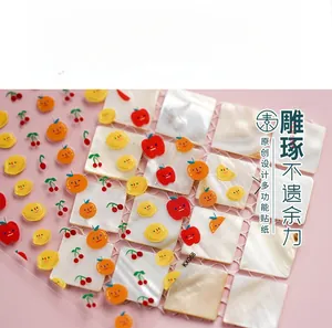 Detail of 5D fruit nail stickers with hand-drawn apples and lemons on transparent base