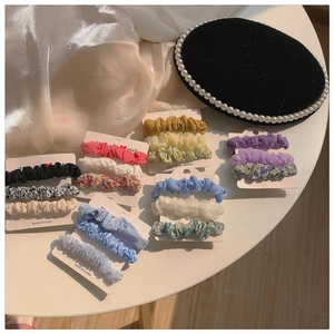 Set of 3 floral and plaid scrunchies on display cards with soft vintage aesthetic