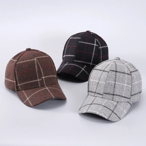 Three houndstooth plaid baseball caps in brown, black and grey for autumn and winter