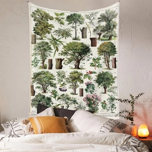 Detail of vintage botanical tapestry with tree illustrations on a cozy bedroom wall