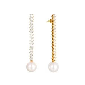 Macro view of gold s925 silver pearl drop earrings with vertical cubic zirconia stones