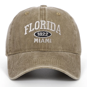 Detailed front view of khaki washed cotton baseball cap with Florida embroidery