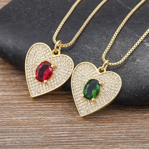 Exquisite gold-plated heart pendant necklaces with vibrant red and green oval center stones