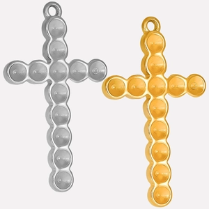 Detail view showing gold and silver 304 stainless steel bubble cross pendants side by side