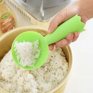 Standing non-stick rice spoon with textured surface and ergonomic handle in green color
