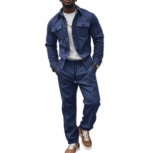 Detail of blue suede two-piece men's set featuring jacket and matching jogger pants