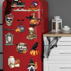 Halloween gnome and skull magnetic stickers on a red vintage fridge with festive decor