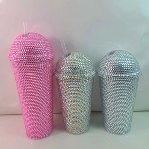 Detailed view of high-capacity double-wall straw cups with sparkling rhinestone inlay