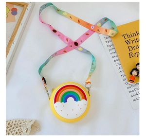 Detail of yellow silicone rainbow crossbody bag for kids with adjustable cartoon strap