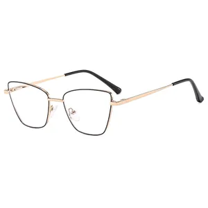 Cat-eye metal frame glasses in black and gold finish with blue light blocking lenses