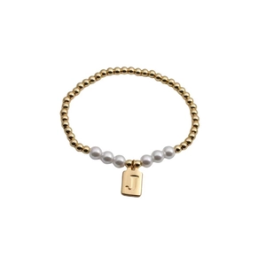 Detail of beaded bracelet with gold beads, white pearls, and embossed letter J pendant