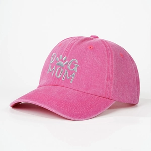 Detailed embroidery of DOG MOM with paw print on washed rose red baseball cap texture