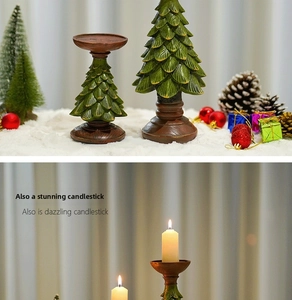 Close-up of a green Christmas tree candle holder on snow with festive ornaments